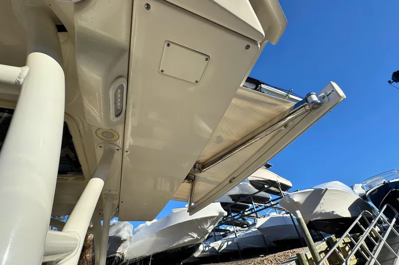 Slide: The Image of 2020 Sailfish 360 CC boat detail with blue sky and ocean backdrop. - 31