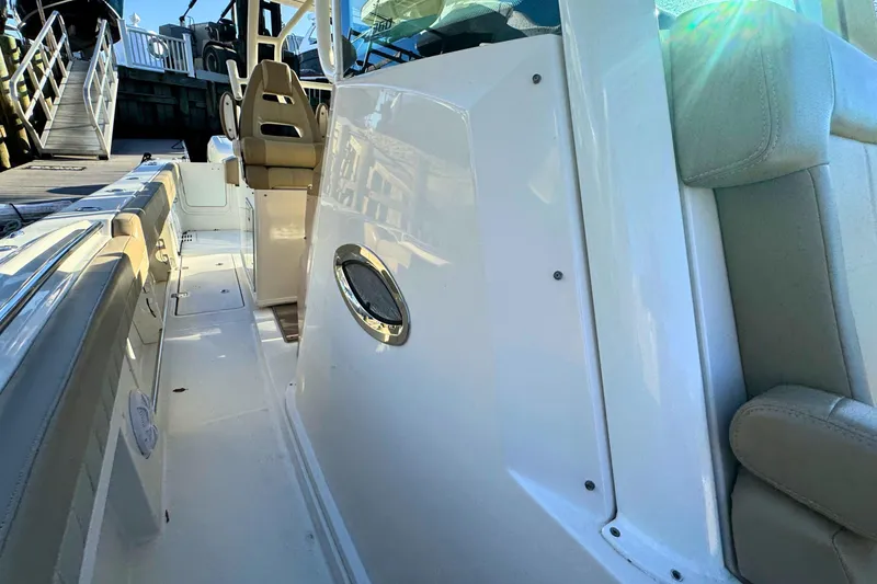 Slide: The Image of 2020 Sailfish 360 CC boat interior with seating and ocean view. - 44