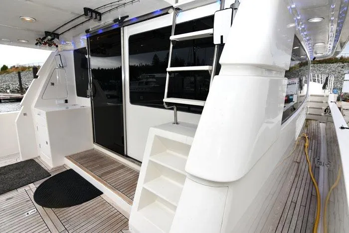 Slide: The Image of 2001 Symbol Raised Pilothouse Motoryacht deck with sleek design and modern amenities. - 5