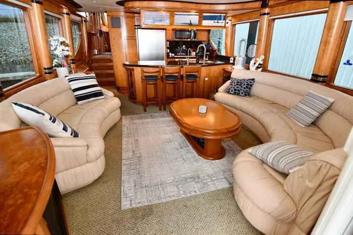 Slide: The Image of Luxurious 2001 Symbol Raised Pilothouse Motoryacht interior with elegant seating and modern kitchen. - 7