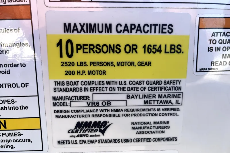 Slide: The Image of 2023 Bayliner VR6 Bowrider OB capacity label, 10 persons or 1654 lbs, 200 HP motor. - 10