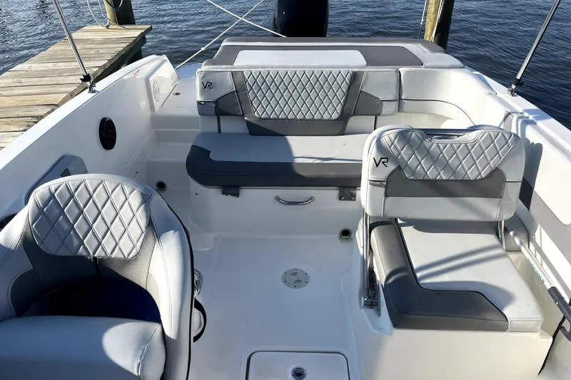 Slide: The Image of 2023 Bayliner VR6 Bowrider OB interior with stylish seating and modern design. - 6