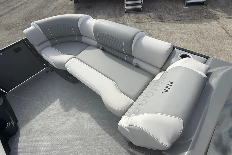 Slide: The Image of Luxurious seating on 2026 Avalon 2585 Excalibur LTD, featuring plush gray upholstery. - 14