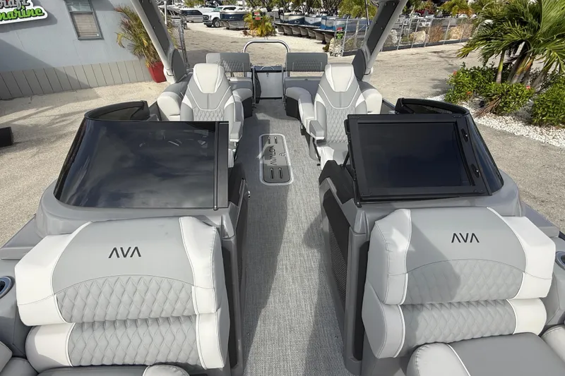Slide: The Image of 2026 Avalon 2585 Excalibur LTD boat interior with quad loungers and modern design. - 16