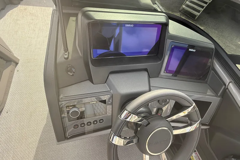 Slide: The Image of Dashboard of 2026 Avalon 2585 Excalibur LTD with Simrad displays and steering wheel. - 20