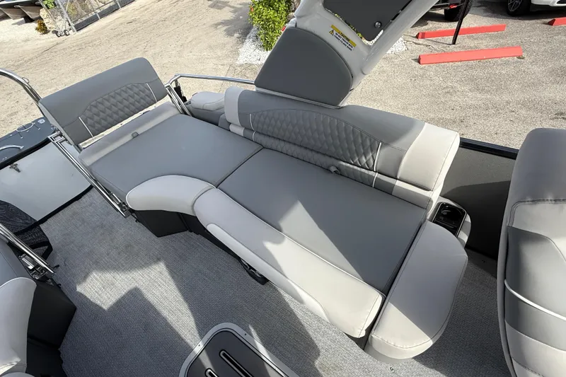 Slide: The Image of Luxurious seating on 2026 Avalon 2585 Excalibur LTD pontoon boat with Mercury V-10 motor. - 23