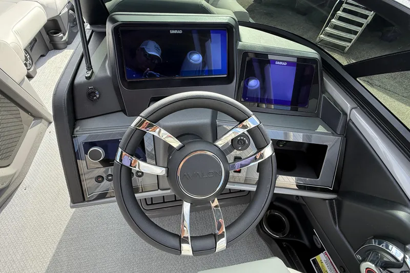 Slide: The Image of Steering console of 2026 Avalon 2585 Excalibur LTD with advanced navigation displays. - 28