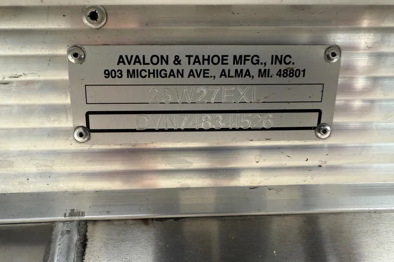 Slide: The Image of Metal identification plate for Avalon & Tahoe MFG, Inc., featuring model and serial numbers. - 29