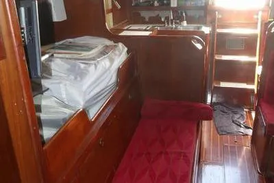 Slide: The Image of Interior of a 1979 Tartan T 37 yacht with wooden furnishings. - 27