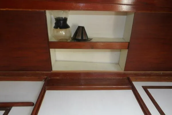 Slide: The Image of Wooden interior shelf with coffee pot and filter, Tartan T 37, 1979 model. - 28