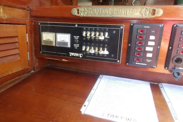 Slide: The Image of Control panel of a 1979 Tartan T 37 sailboat in the captain's quarters. - 33