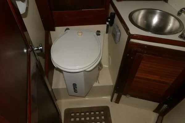 Slide: The Image of 1979 Tartan T 37 yacht bathroom with toilet and sink. - 35