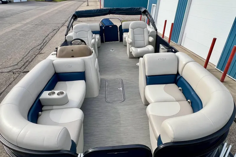 Slide: The Image of 2018 Manitou 23 Aurora LE pontoon boat with spacious seating and modern design. - 12