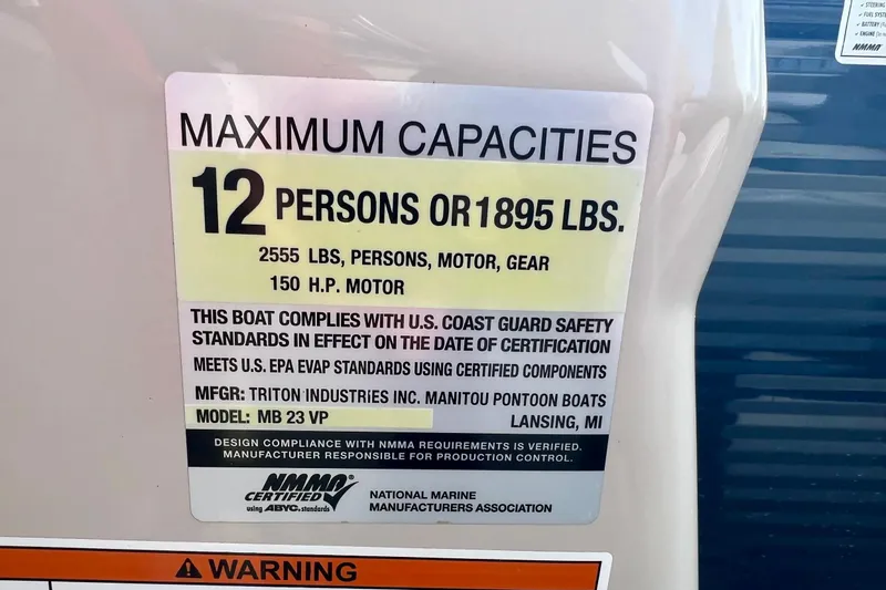 Slide: The Image of 2018 Manitou 23 Aurora LE capacity label: 12 persons, 1895 lbs, 150 HP motor. - 22