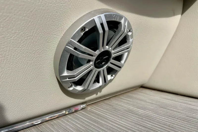 Slide: The Image of Speaker on 2018 Manitou 23 Aurora LE boat interior, featuring sleek design and metallic finish. - 39