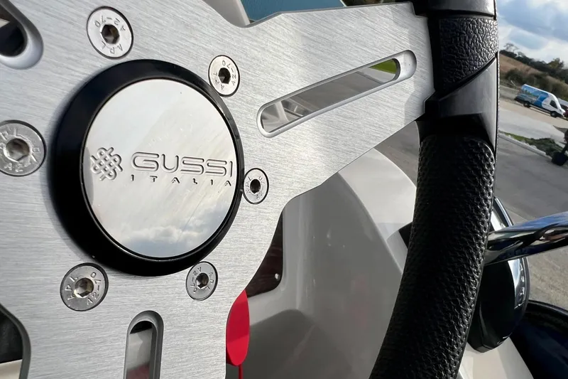 Slide: The Image of Steering wheel of 2018 Manitou 23 Aurora LE with Gussi Italia design. - 49