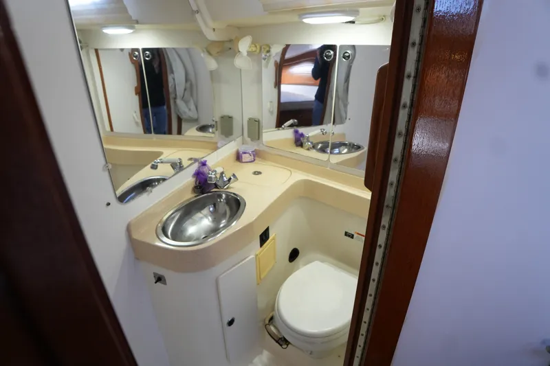Slide: The Image of Bathroom interior of 2002 Catalina 42 Mark II yacht with sink and toilet. - 16