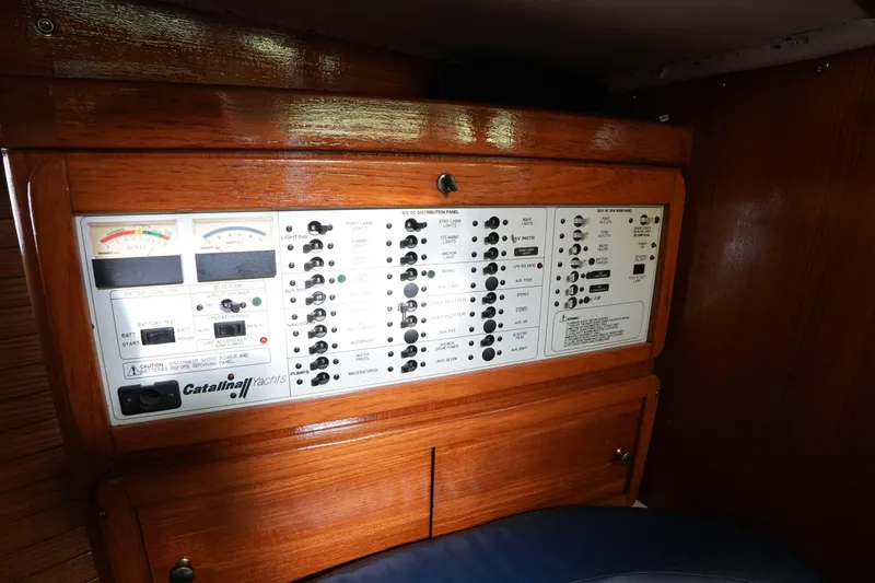 Slide: The Image of Electrical control panel inside a 2002 Catalina 42 Mark II yacht cabin. - 20