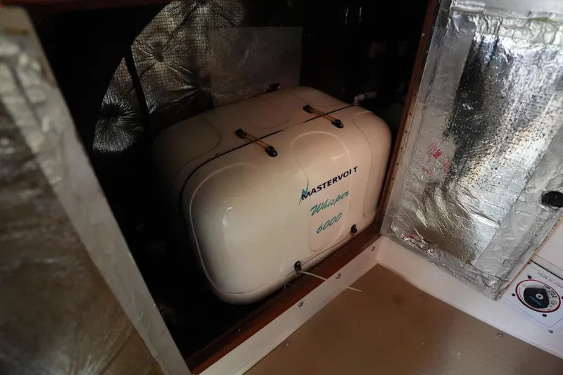Slide: The Image of Mastervolt Whisper 6000 generator in 2002 Catalina 42 Mark II yacht engine room. - 29