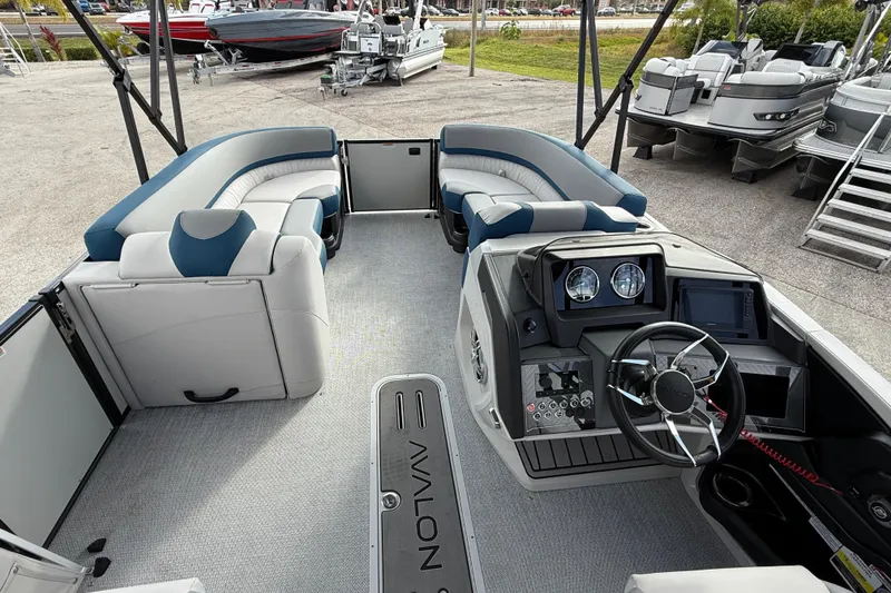 Slide: The Image of 2026 Avalon 2385 Catalina Quad Lounger, Tri Toon High Performance interior with modern dashboard and seating. - 15