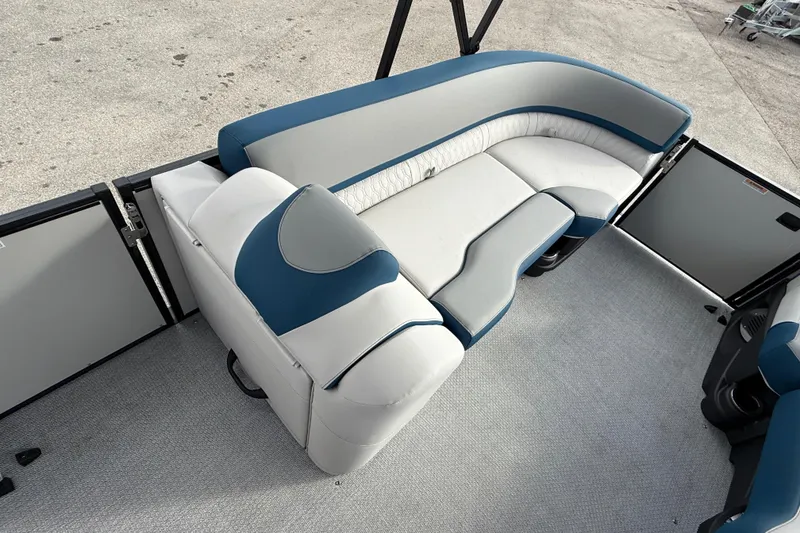 Slide: The Image of 2026 Avalon 2385 Catalina Quad Lounger interior with blue and white seating. - 16