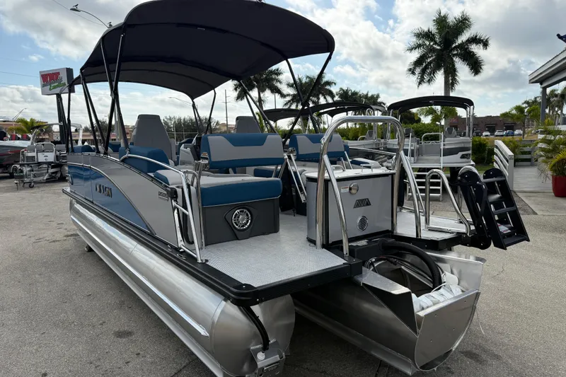 Slide: The Image of 2026 Avalon 2385 Catalina Quad Lounger, Tri Toon High Performance boat with canopy and seating. - 9