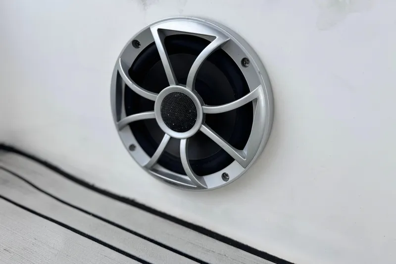 Slide: The Image of Speaker on 2021 Yamaha Boats 195S, featuring sleek silver grille design. - 15