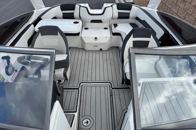 Slide: The Image of 2021 Yamaha Boats 195S interior with sleek seating and modern design. - 16