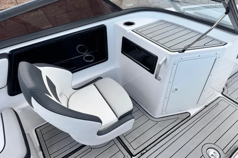 Slide: The Image of 2021 Yamaha Boats 195S interior with sleek seating and modern dashboard design. - 21