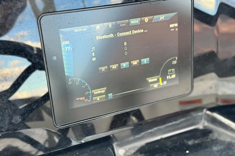 Slide: The Image of Dashboard display of a 2021 Yamaha Boats 195S showing Bluetooth connection options. - 27