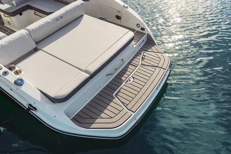 Slide: The Image of Manufacturer Provided Image: 2025 Sea Ray SDX 250 boat with spacious swim platform on calm water. - 10