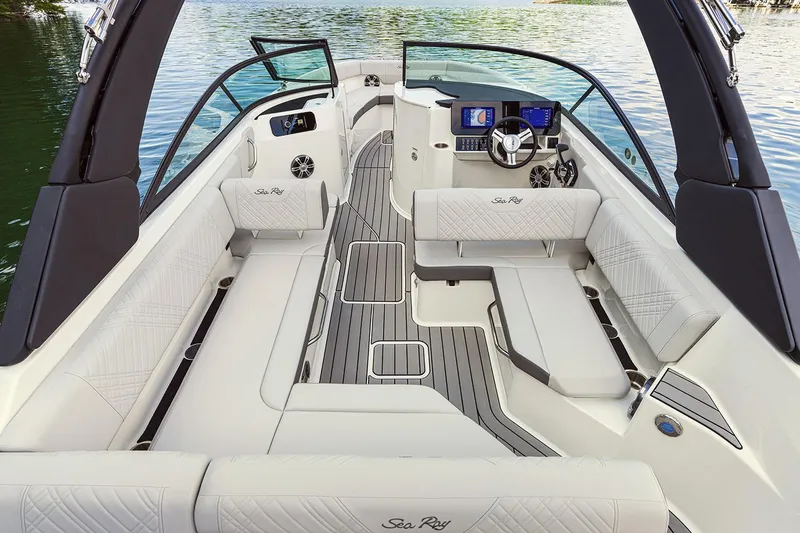 Slide: The Image of Manufacturer Provided Image: 2025 Sea Ray SDX 250 boat interior with luxurious seating and modern dashboard. - 8