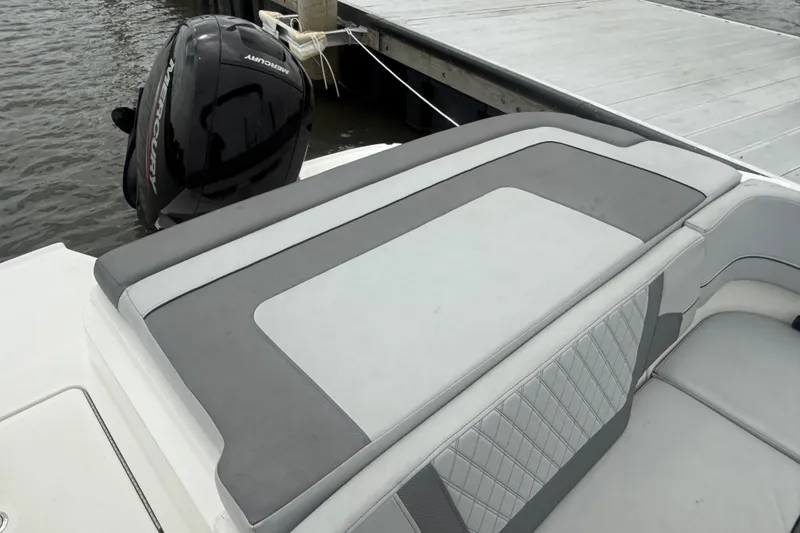 Slide: The Image of 2023 Bayliner VR6 Bowrider OB with Mercury outboard engine at dock. - 12