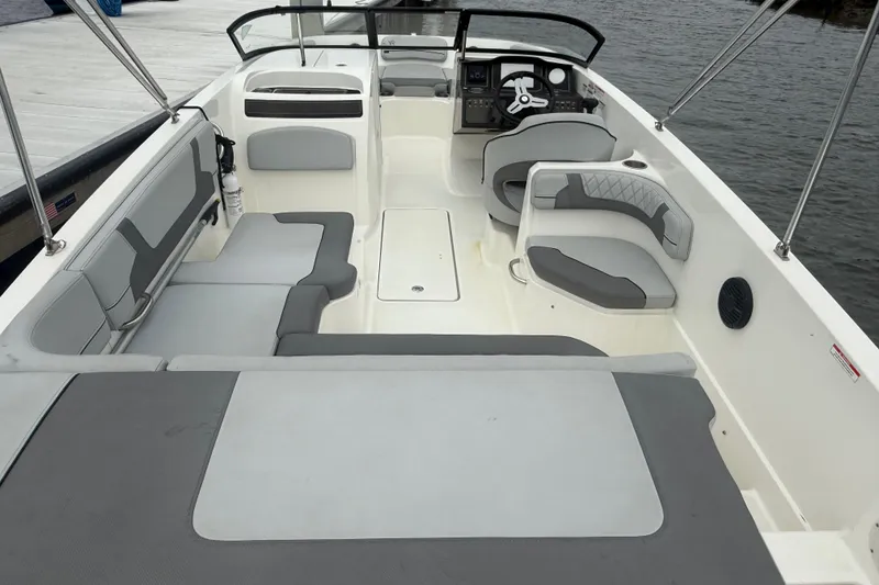 Slide: The Image of 2023 Bayliner VR6 Bowrider OB interior with spacious seating and modern design. - 8