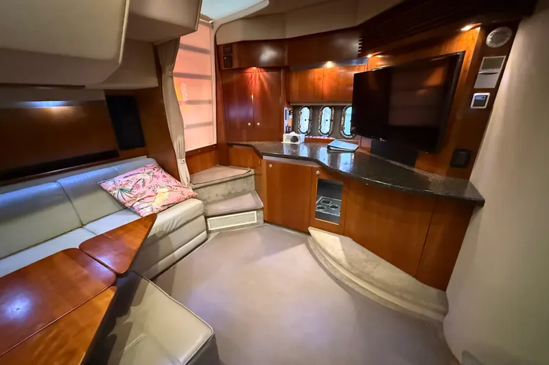 Slide: The Image of Luxurious interior of 2005 Cruisers Yachts 420 Express with modern amenities and elegant design. - 17