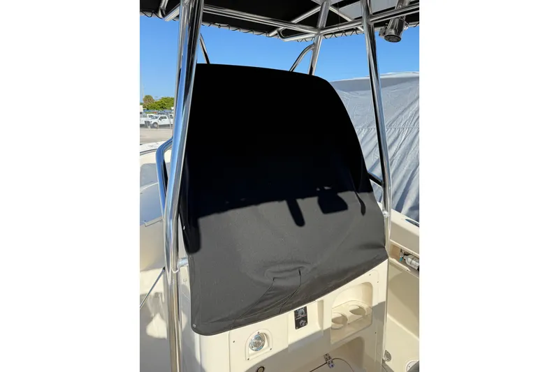 Slide: The Image of 2008 Pursuit C 250 Center Console boat with covered helm station. - 13