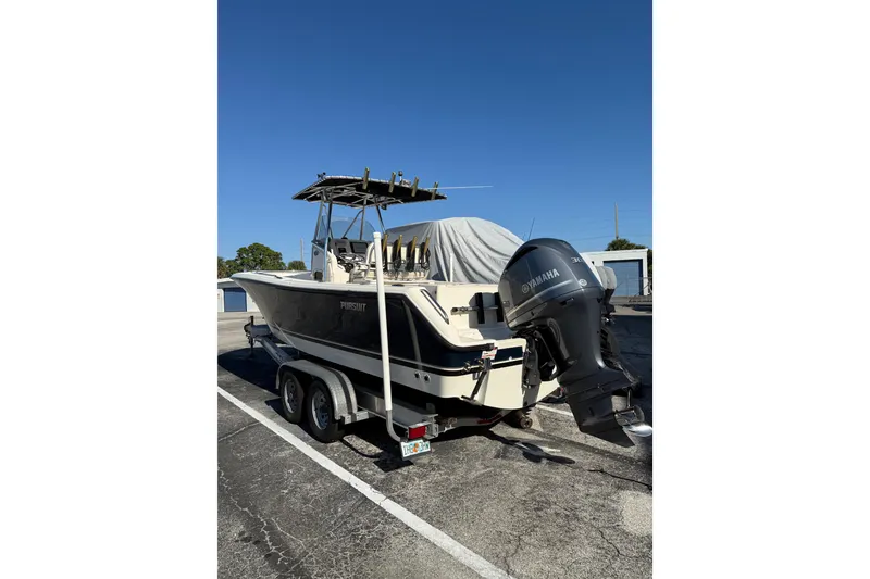 Slide: The Image of 2008 Pursuit C 250 Center Console boat on trailer with Yamaha outboard motor. - 3