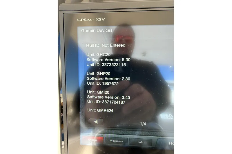 Slide: The Image of Garmin GPSMAP XSV display on 2014 Intrepid 327 Center Console showing device software versions. - 27