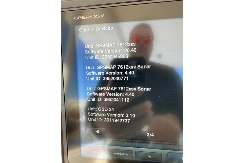 Slide: The Image of Garmin GPSMAP XSV display on 2014 Intrepid 327 Center Console showing software versions and unit IDs. - 29