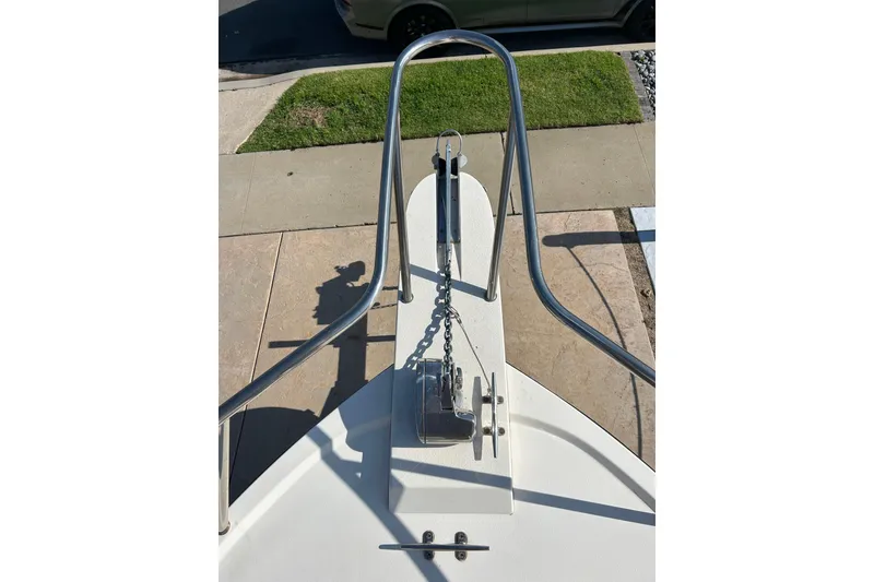 Slide: The Image of Bow view of 2000 Parker 2520 XLD Sport Cabin with anchor and railing. - 15