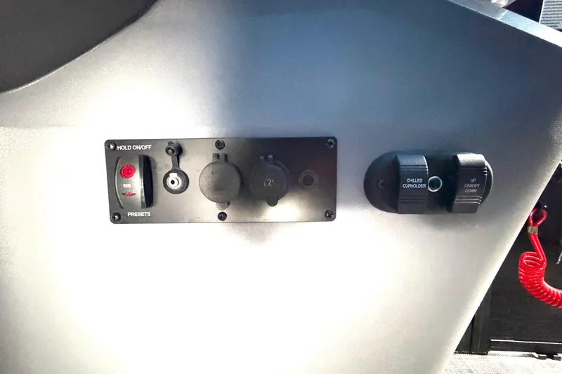 Slide: The Image of Control panel of 2026 Godfrey Sweetwater 2286 SBC boat with switches and outlets. - 12