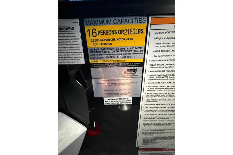 Slide: The Image of Capacity label on 2026 Godfrey Sweetwater 2286 SBC, indicating 16-person or 2180 lbs limit. - 13