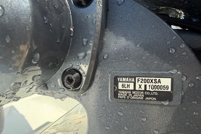 Slide: The Image of Close-up of Yamaha F200XSA engine label on 2024 Contender 25 Tournament boat. - 19