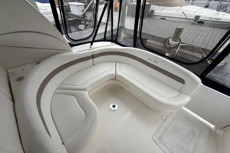 Slide: The Image of Luxurious seating area on a 2003 Sea Ray 320 Sundancer yacht. - 11