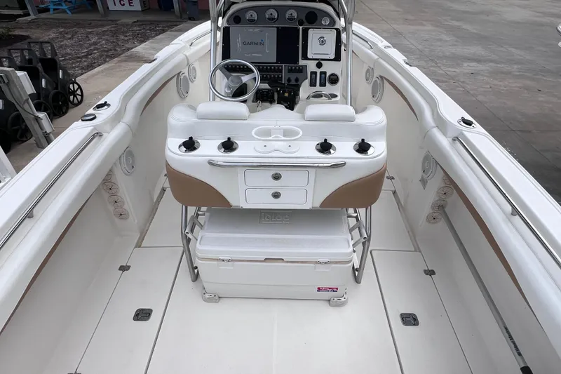 Slide: The Image of 2003 Wellcraft 29 CCF boat interior with steering console and seating. - 17