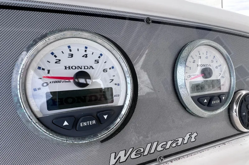 Slide: The Image of Dashboard of 2003 Wellcraft 29 CCF boat with Honda gauges. - 30