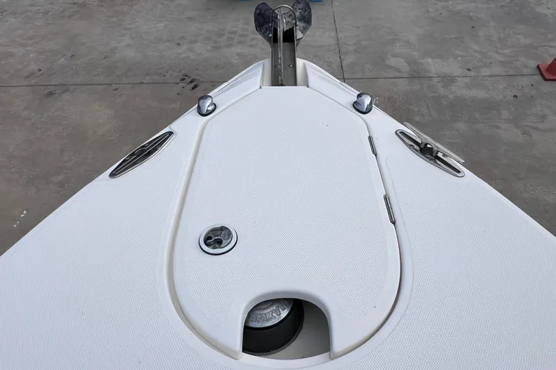 Slide: The Image of Bow of 2003 Wellcraft 29 CCF boat with anchor and cleats. - 37