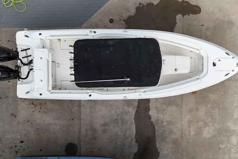 Slide: The Image of Overhead view of 2003 Wellcraft 29 CCF boat on concrete surface. - 4