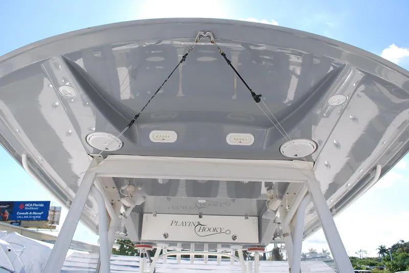 Slide: The Image of 2019 Cobia 344 Center Console boat, view of the underside of the T-top. - 21