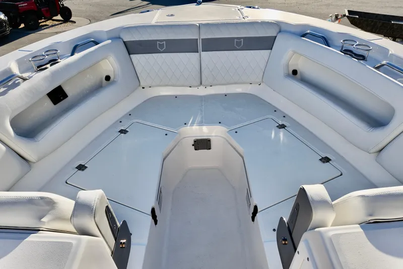 Slide: The Image of 2026 Sea Fox 288 Traveler boat interior with white seating and storage compartments. - 10